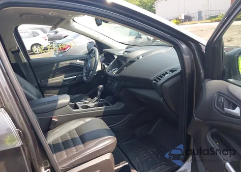 2017 Ford Escape Titanium z USA, uszkodzony, nr VIN 1FMCU9J99HUE27597